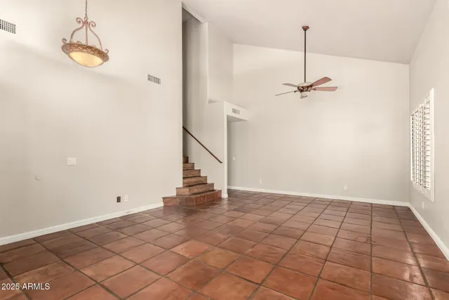 a view of empty room with a window