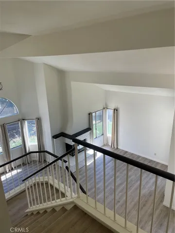 a view of staircase with lots of white walls