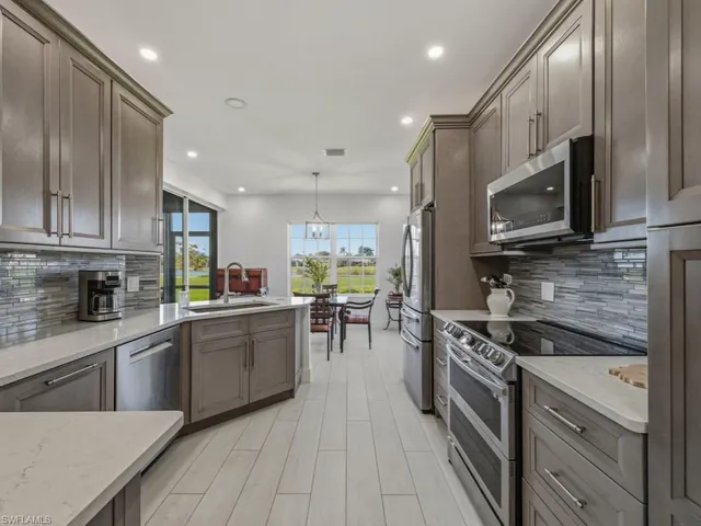 $690,000 | 5927 3 Iron Drive, Unit 3102, Naples, FL 34110