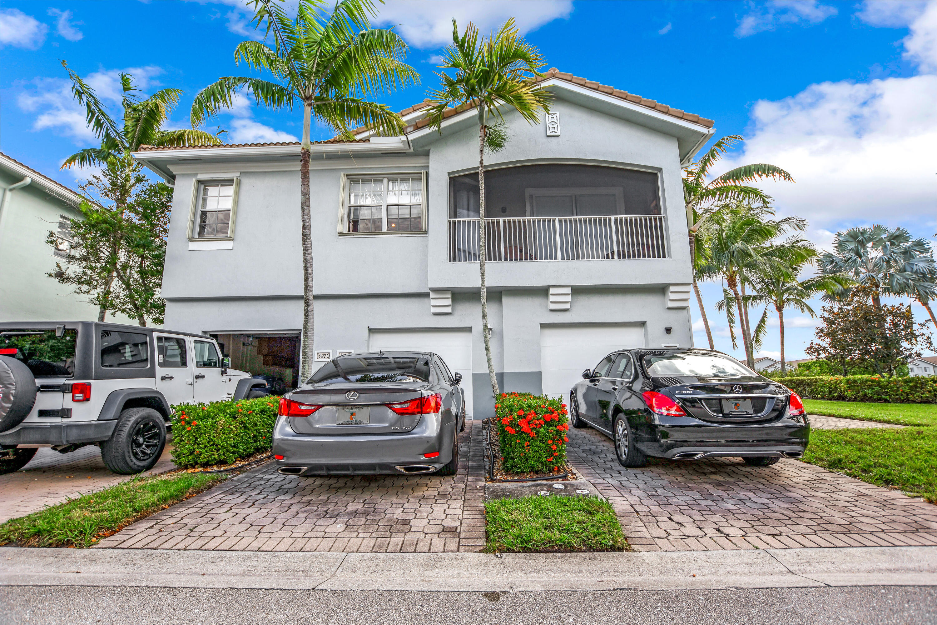3268 Laurel Ridge Circle Riviera Beach, FL 33404 - Photo 19 of 33 Garage Driveway
