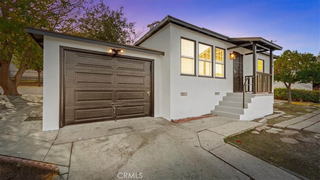 5204 Coney Road Los Angeles, CA 90032 - Photo 1 of 1 a front view of a house with a yard