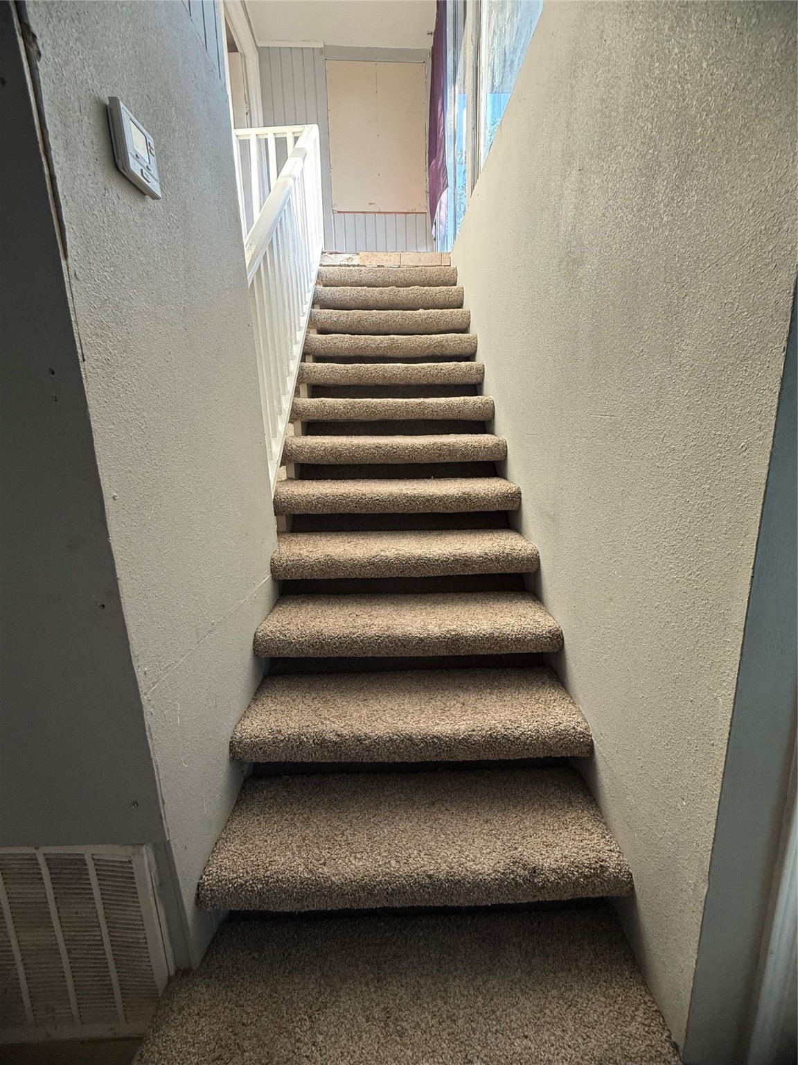 8412 Peekskill Lane Houston, TX 77075 - Photo 20 of 45 stairway to upstairs primary bedroom