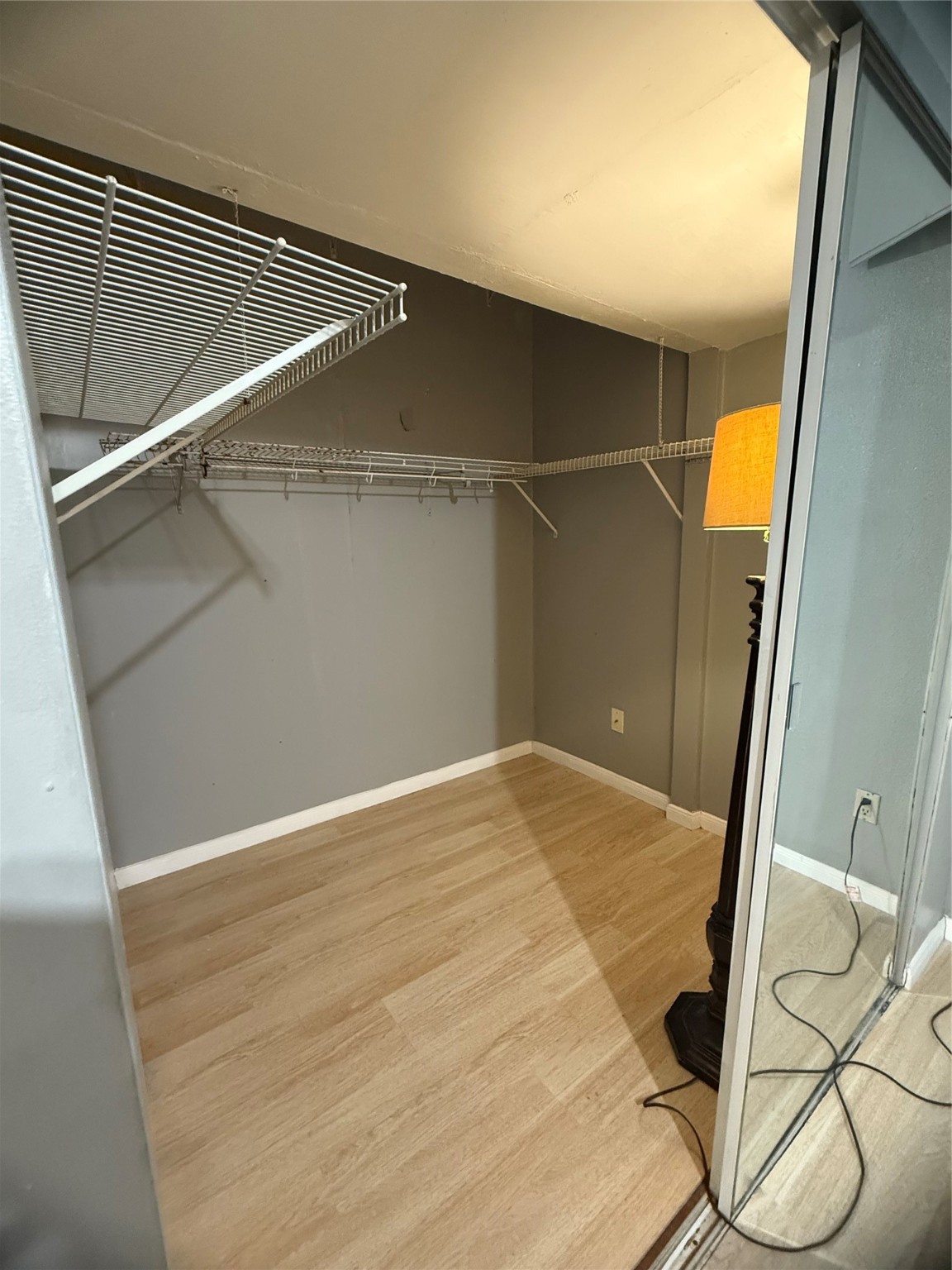 8412 Peekskill Lane Houston, TX 77075 - Photo 23 of 45 primary bedroom with tall walk-in closet