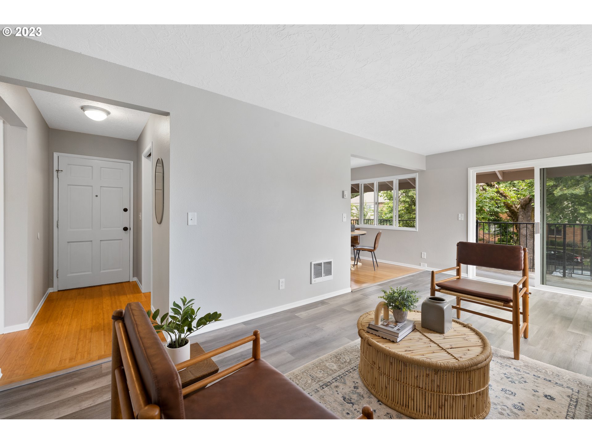 2038 Northeast Clackamas Street Portland, OR 97232 - Photo 8 of 32 a living room with furniture and a potted plant