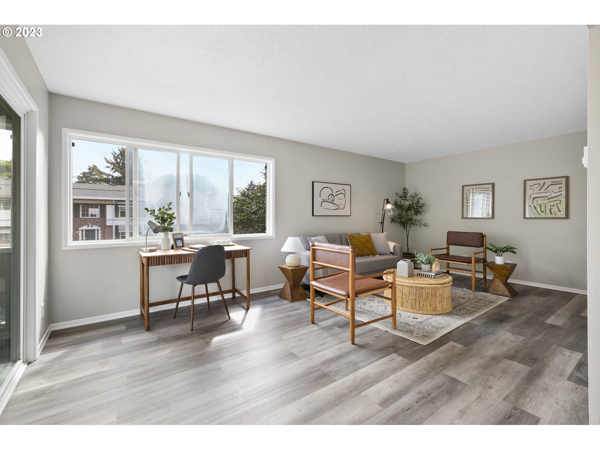 2038 Northeast Clackamas Street Portland, OR 97232 - Photo 9 of 32 a living room with furniture and a wooden floor