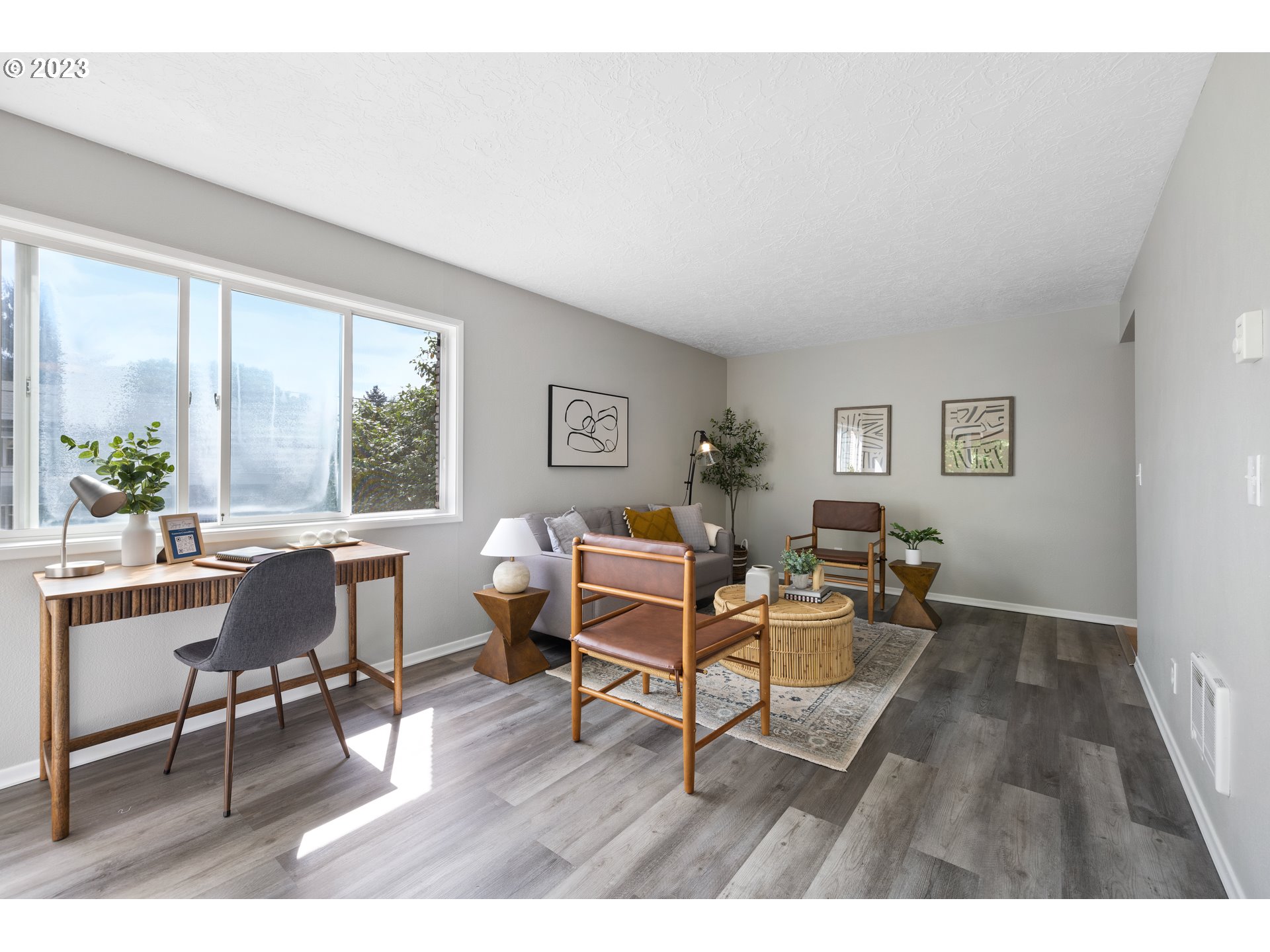 2038 Northeast Clackamas Street Portland, OR 97232 - Photo 10 of 32 a living room with furniture and a large window