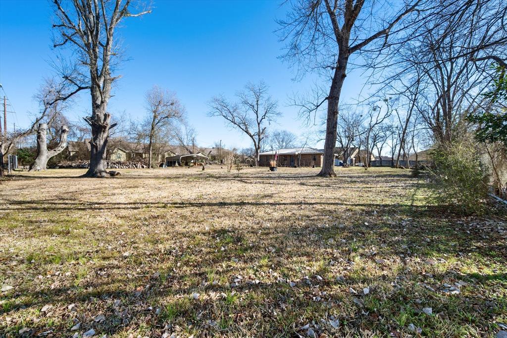448 South Bateman Road Fairfield, TX 75840 - Photo 15 of 24 a view of road with large trees