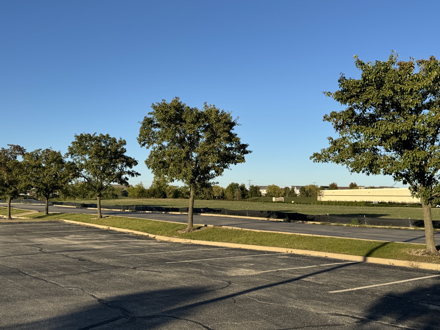 Lot 8 Laraway Road New Lenox, IL 60451 - Photo 2 of 9 a view of a swimming pool with an outdoor space and seating area