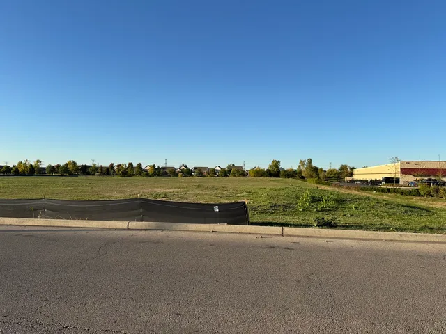 a view of a lake with a city view