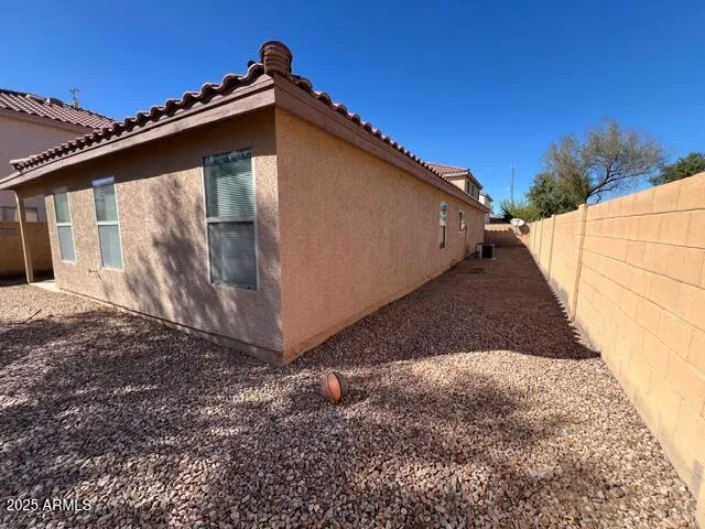 a backyard of a house with lots of green space