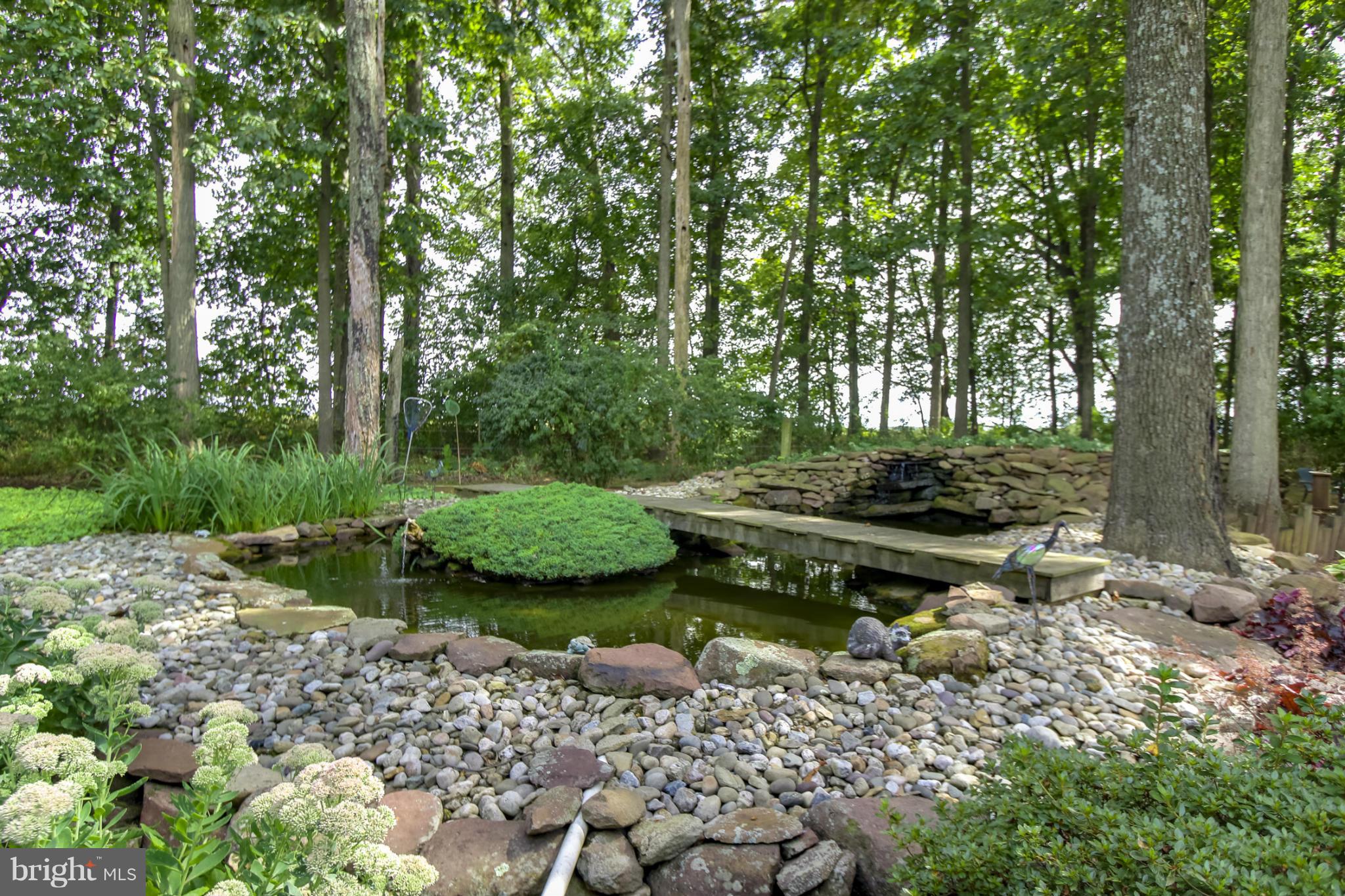 4355 Ruggles Road Taneytown, MD 21787 - Photo 17 of 27 a backyard of a house with lots of green space