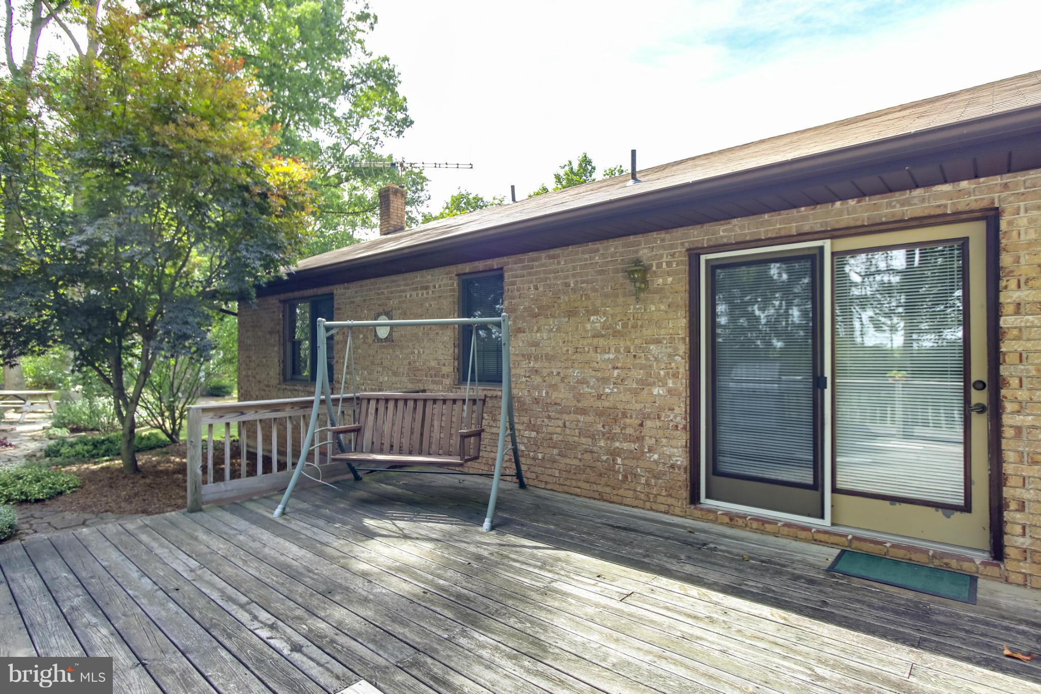 4355 Ruggles Road Taneytown, MD 21787 - Photo 21 of 27 a view of house with backyard and wooden floor