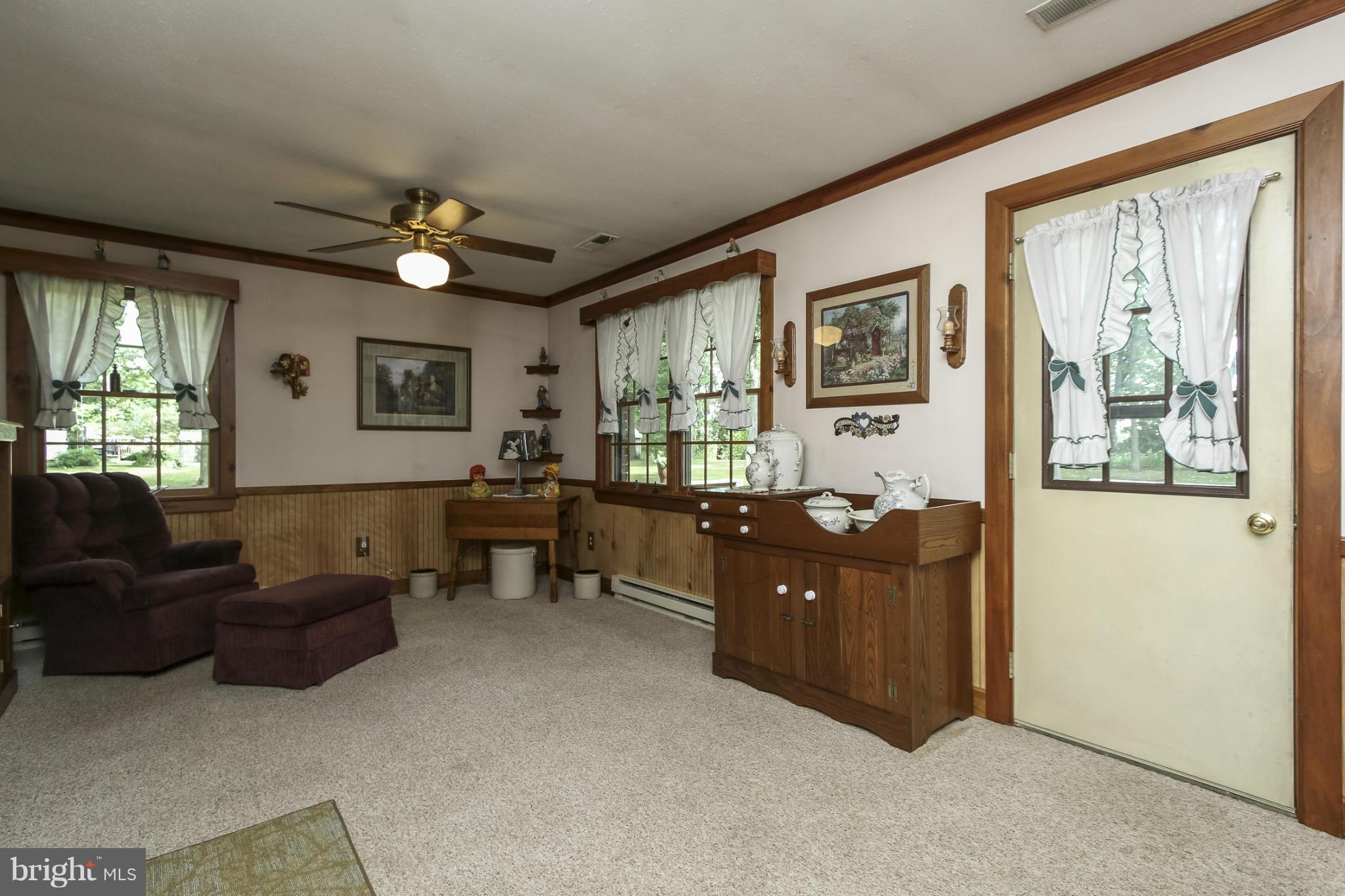 4355 Ruggles Road Taneytown, MD 21787 - Photo 7 of 27 a living room with furniture and windows