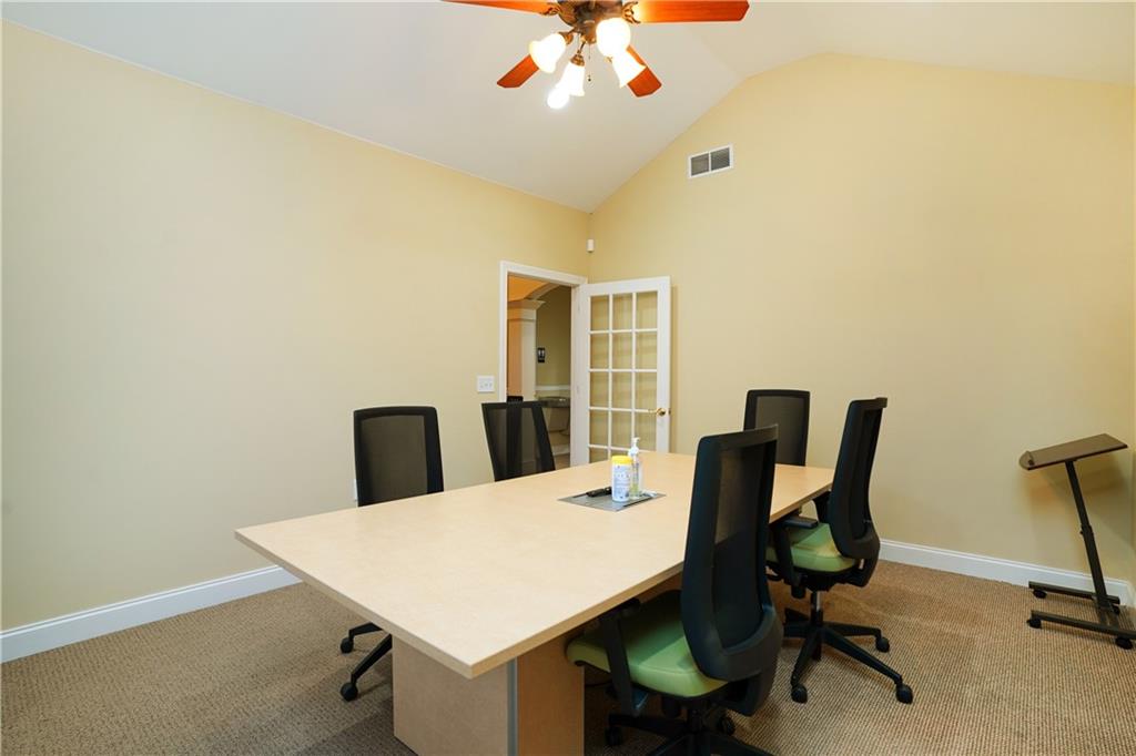 2775 Cruse Road Northwest, Unit 802 Lawrenceville, GA 30044 - Photo 7 of 16 a view of a workspace with furniture