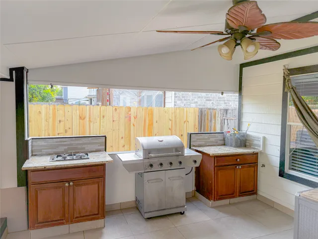 a view of a backyard with a garden and cabin