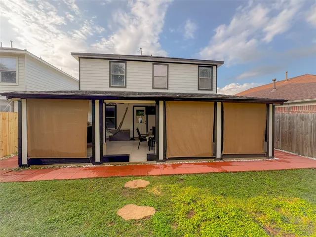 a front view of a house with garage