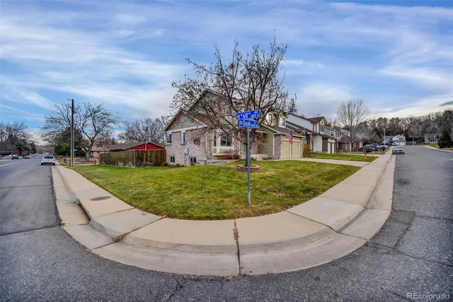 a view of a swimming pool with a yard