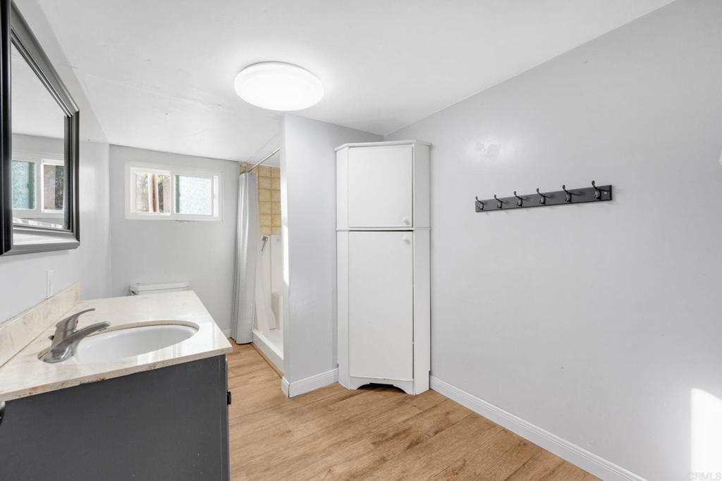 8273 Melrose Lane El Cajon, CA 92021 - Photo 17 of 33 a bathroom with a sink and a mirror