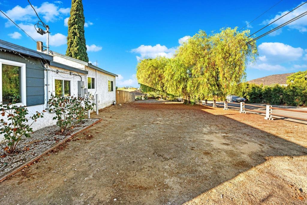 8273 Melrose Lane El Cajon, CA 92021 - Photo 18 of 33 a view of a house with a yard