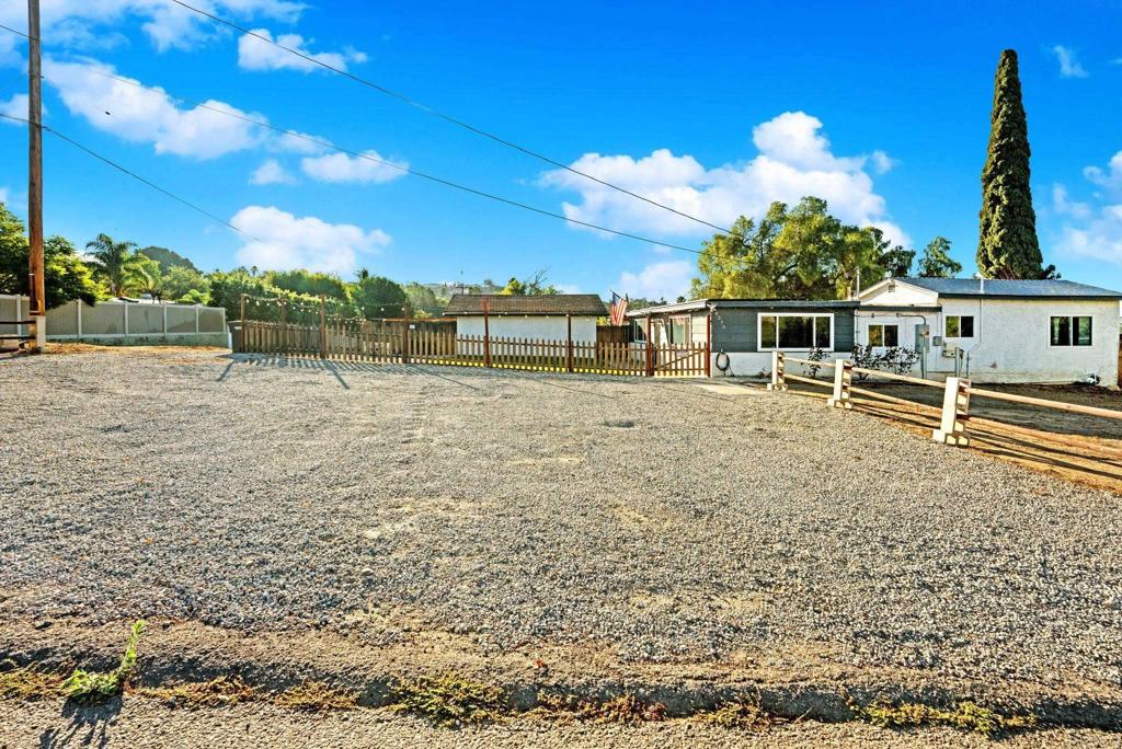 8273 Melrose Lane El Cajon, CA 92021 - Photo 19 of 33 a view of a house with a yard