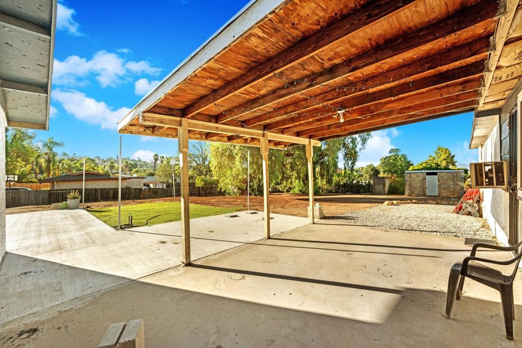 8273 Melrose Lane El Cajon, CA 92021 - Photo 23 of 33 a view of a patio with a table and chairs