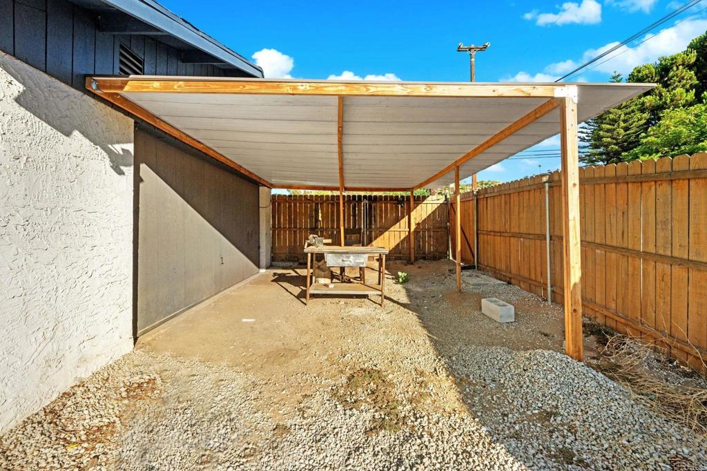 8273 Melrose Lane El Cajon, CA 92021 - Photo 26 of 33 a backyard of a house with table and chairs