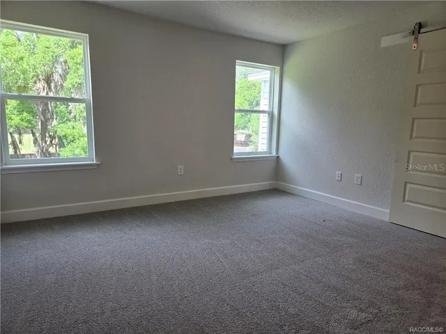 an empty room with a window