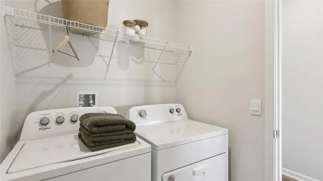 a utility room with dryer and washer