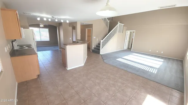 a kitchen with a stove a refrigerator a sink and dishwasher