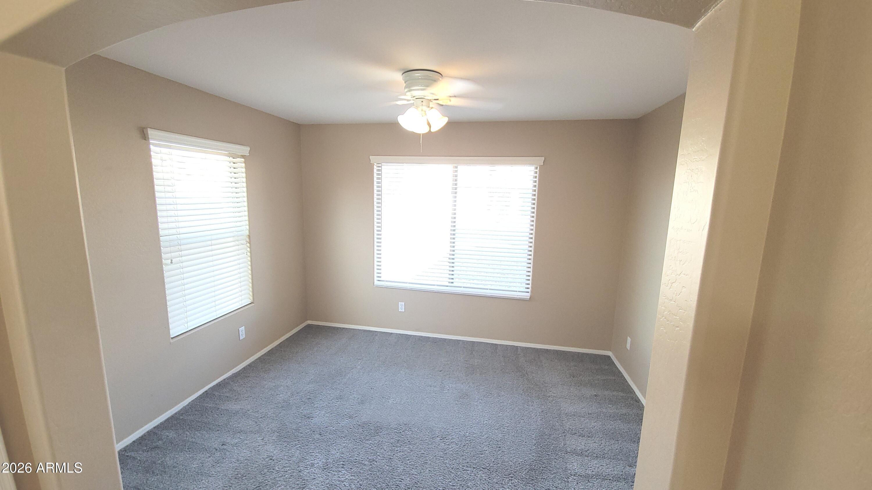 21821 East Via Del Rancho Queen Creek, AZ 85142 - Photo 21 of 35 a view of an empty room with a window