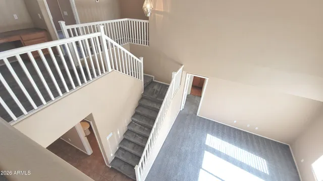 a view of balcony with furniture