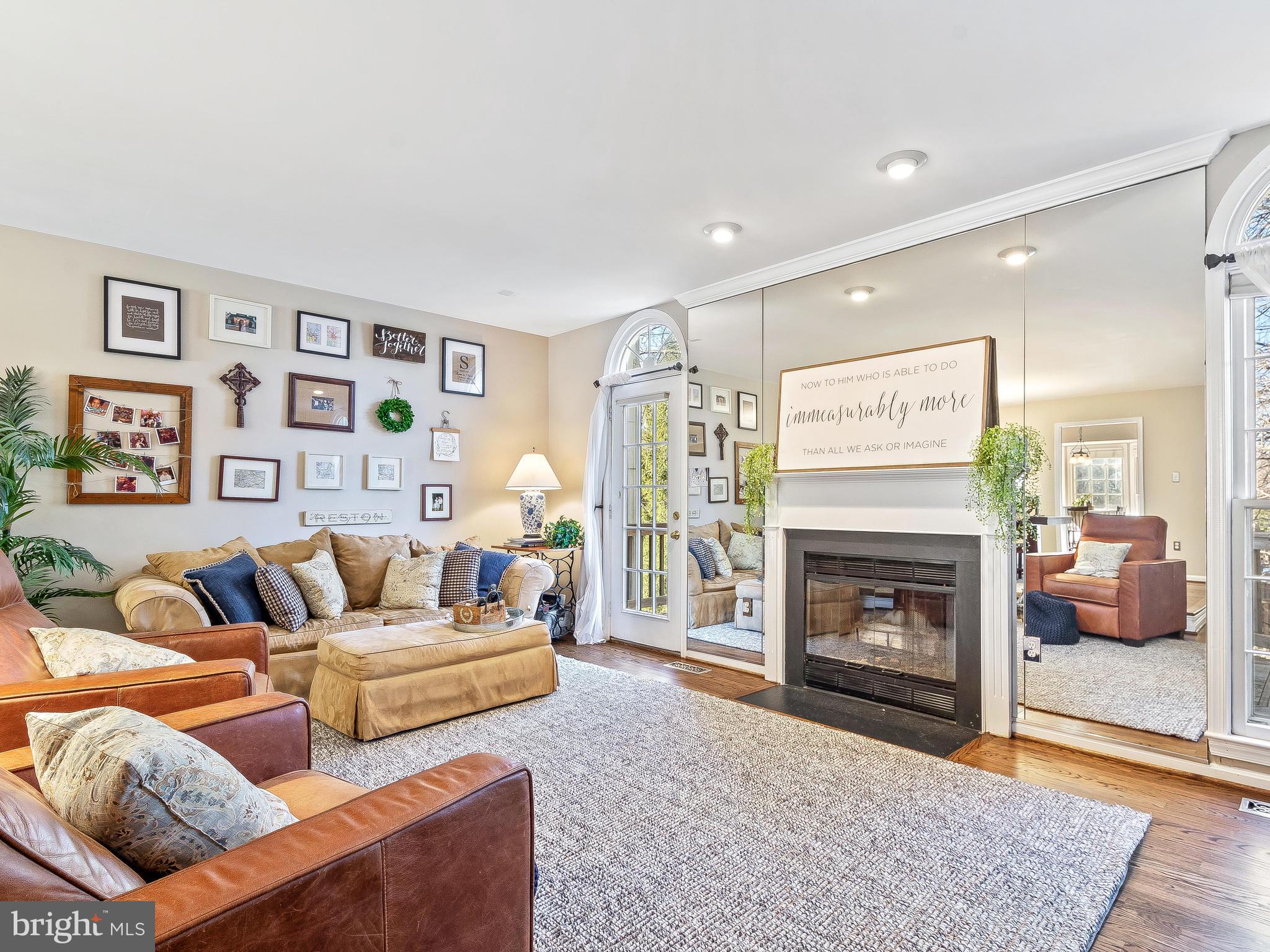 11705 Great Owl Circle Reston, VA 20194 - Photo 11 of 38 Spacious living room with wood burning fireplace