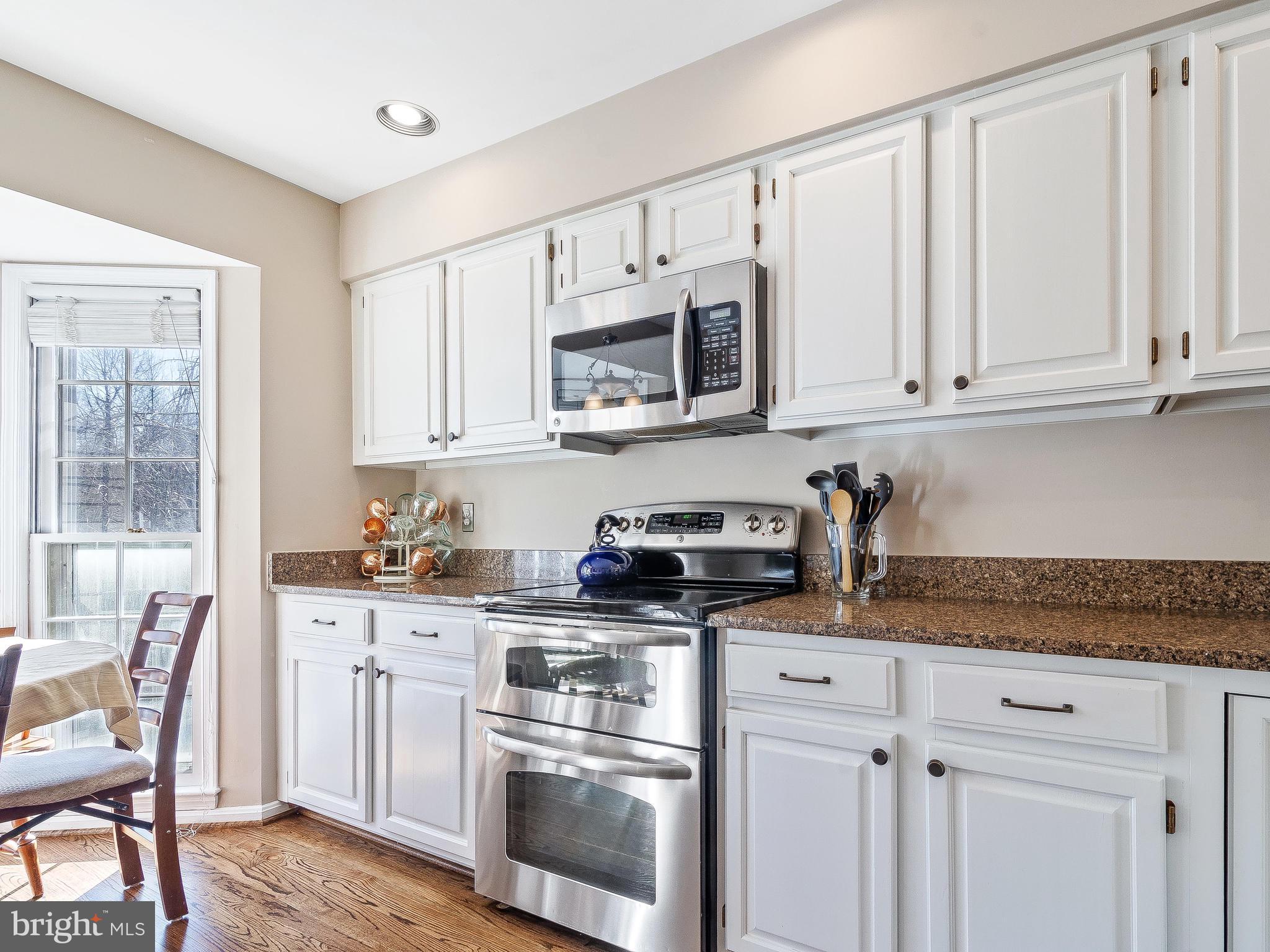 11705 Great Owl Circle Reston, VA 20194 - Photo 5 of 38 Granite countertops & recess lighting