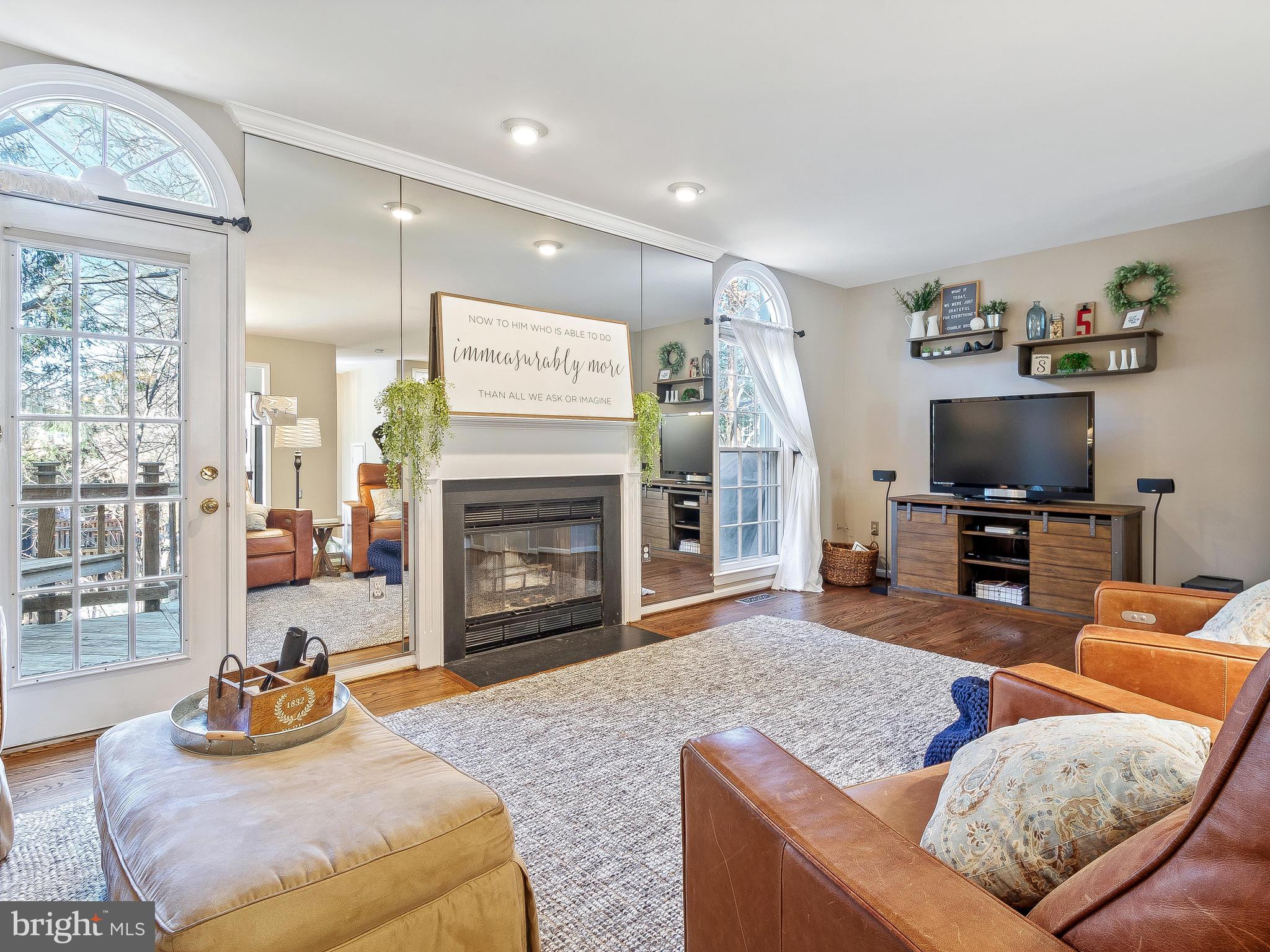 11705 Great Owl Circle Reston, VA 20194 - Photo 9 of 38 Floor to ceiling windows & door leading to deck