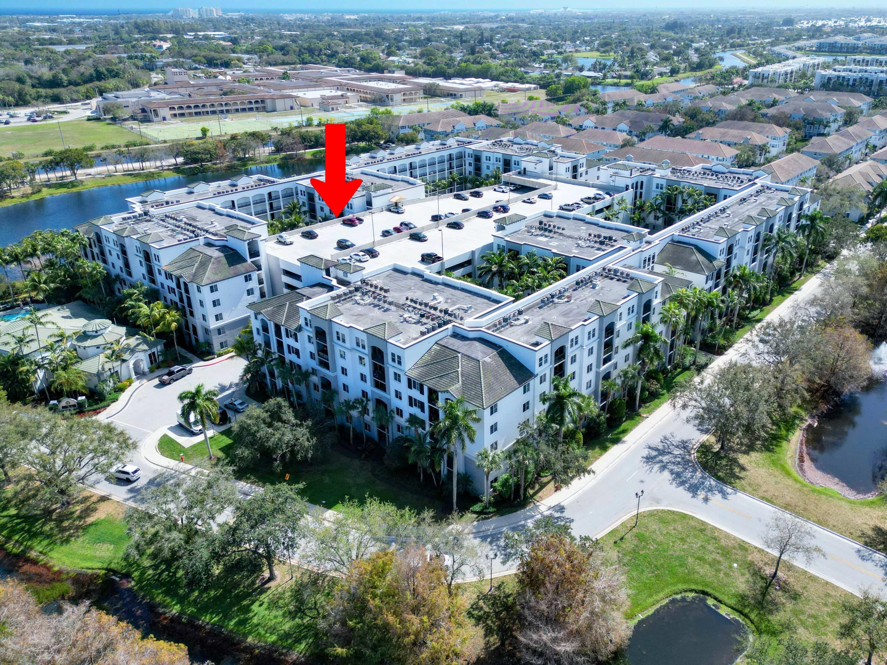 1660 Renaissance Commons Boulevard, Unit 2326 Boynton Beach, FL 33426 - Photo 56 of 57 Drone High NW Corner Arrow