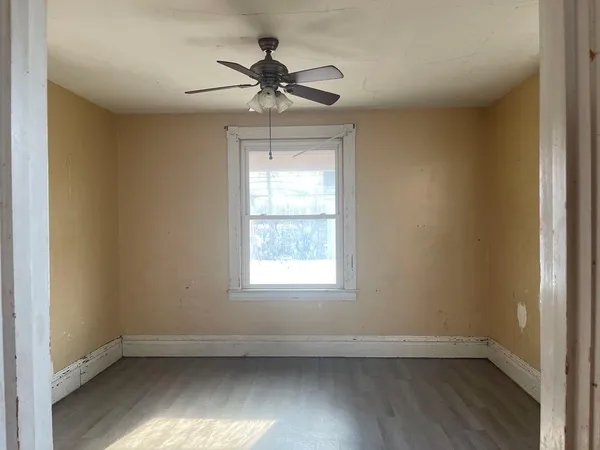 a view of a livingroom with a window