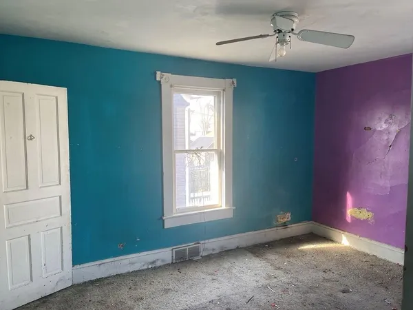 en empty room with windows