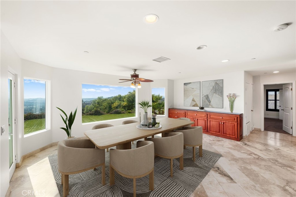 31460 Aquaduct Road Bonsall, CA 92003 - Photo 11 of 57 a view of a dining room with furniture wooden floor and a rug
