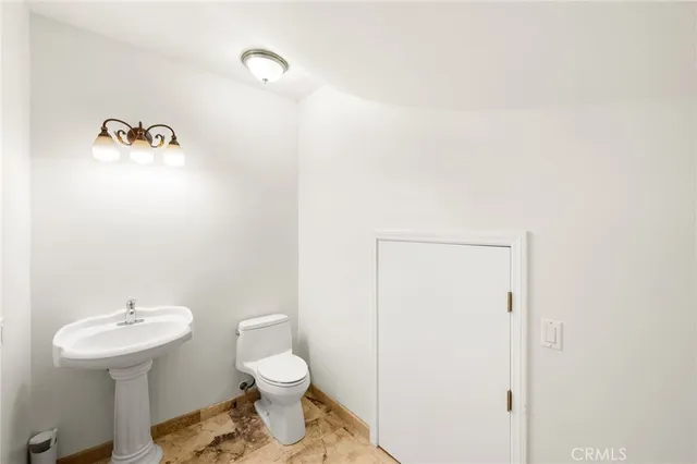 a bathroom with a bathtub and a window