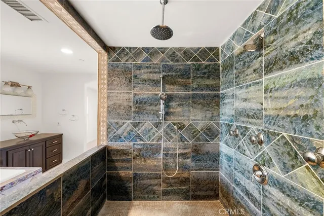 a view of a swimming pool with outdoor seating