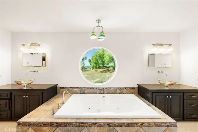 a bedroom with a bed and a tv