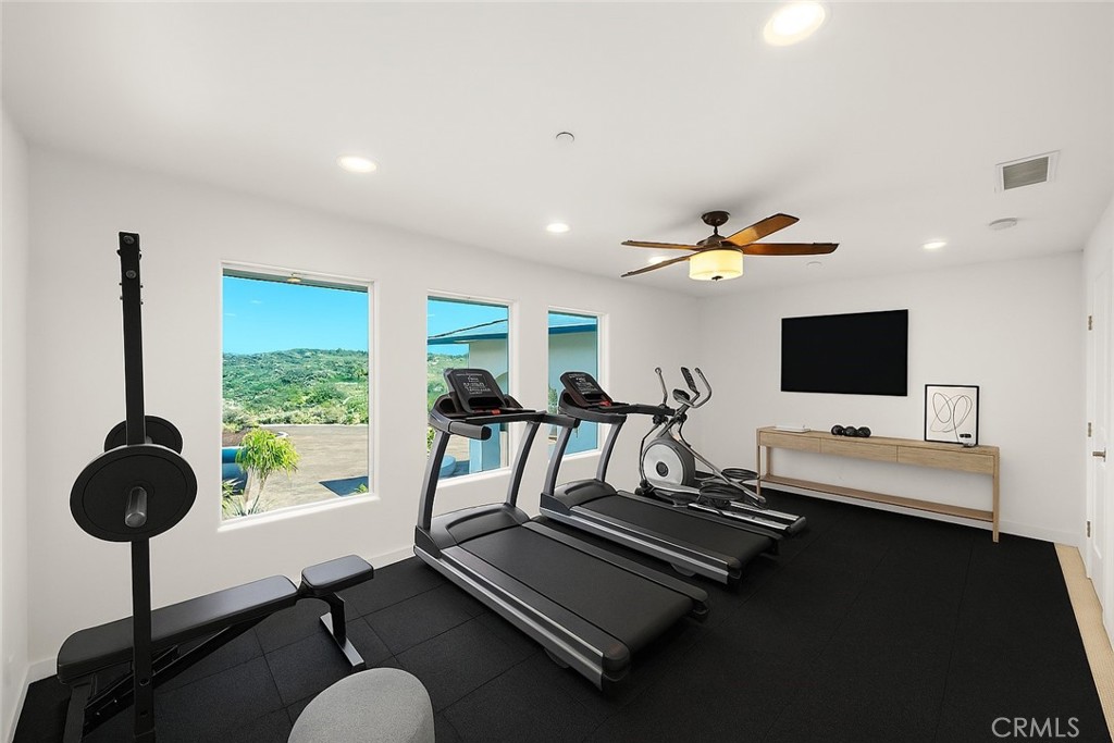31460 Aquaduct Road Bonsall, CA 92003 - Photo 35 of 57 a living room with furniture and a flat screen tv