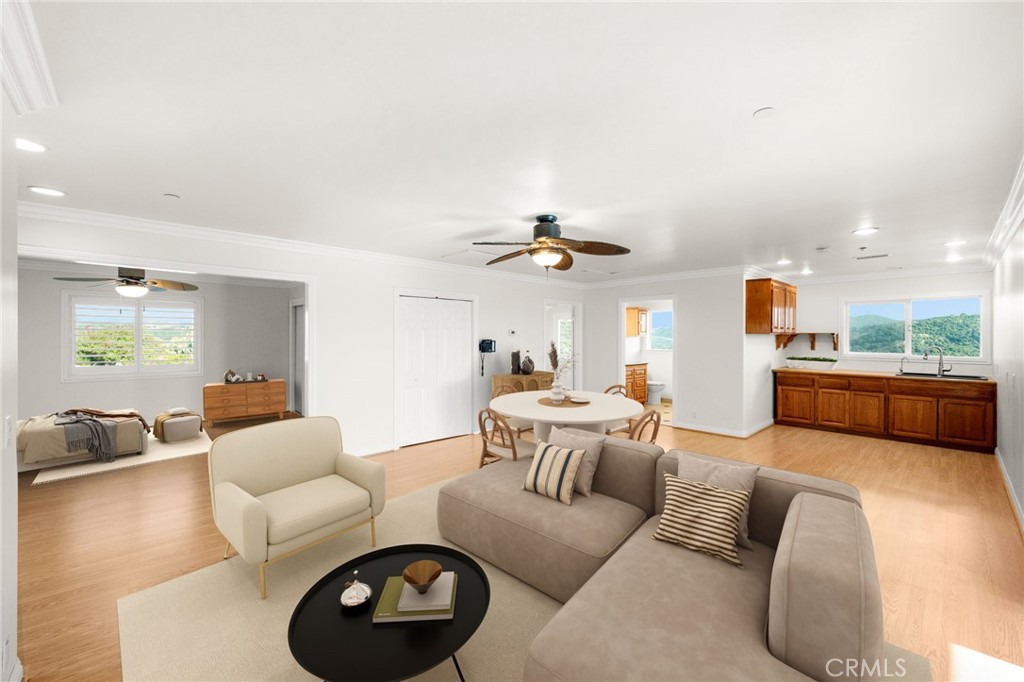 31460 Aquaduct Road Bonsall, CA 92003 - Photo 38 of 57 a living room with furniture and a large window