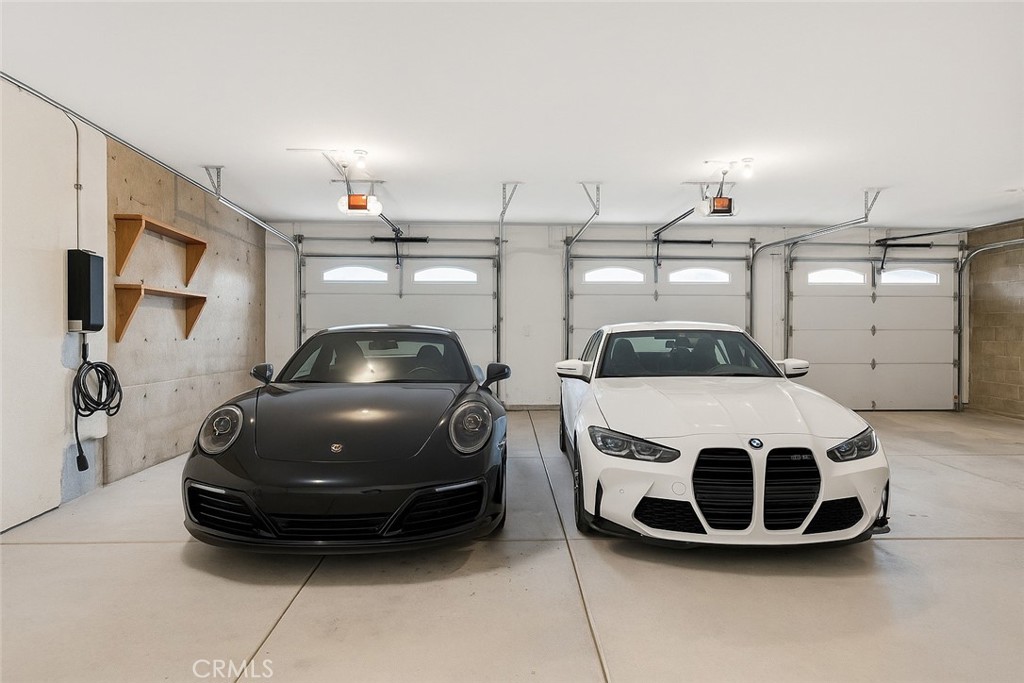 31460 Aquaduct Road Bonsall, CA 92003 - Photo 46 of 57 a car parked in garage