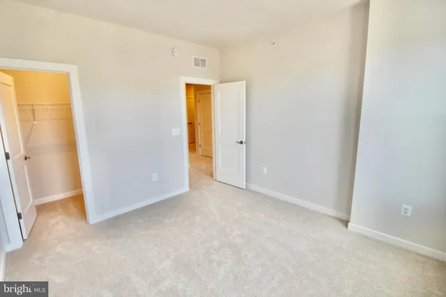 a view of livingroom with washer and dryer