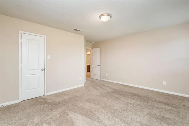 an empty room with an entryway