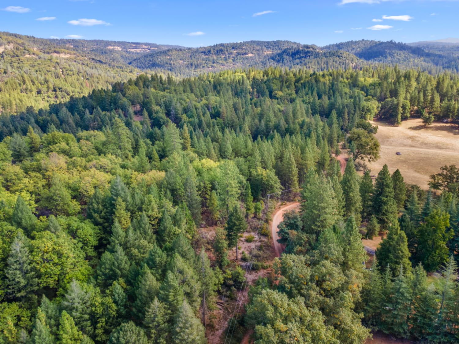 3765 Deer Canyon Road Placerville, CA 95667 - Photo 2 of 8 a view of a city with mountains in the background