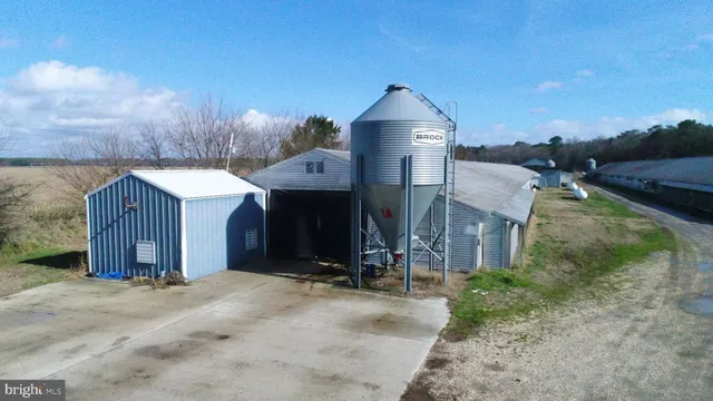 a view of a wooden house with a outdoor space