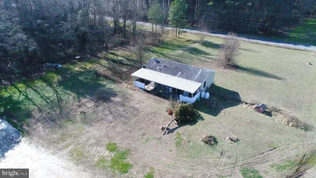 a view of backyard with outdoor space