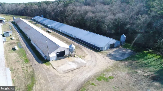 a view of a backyard with sitting area